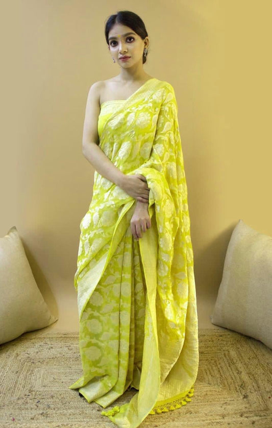 Yellow Soft Silk Saree with Self-Jacquard Weaving and Tassel Border